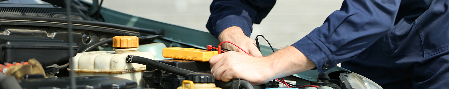 Mechanic doing a service on a vehicle - Car Service Chertsey